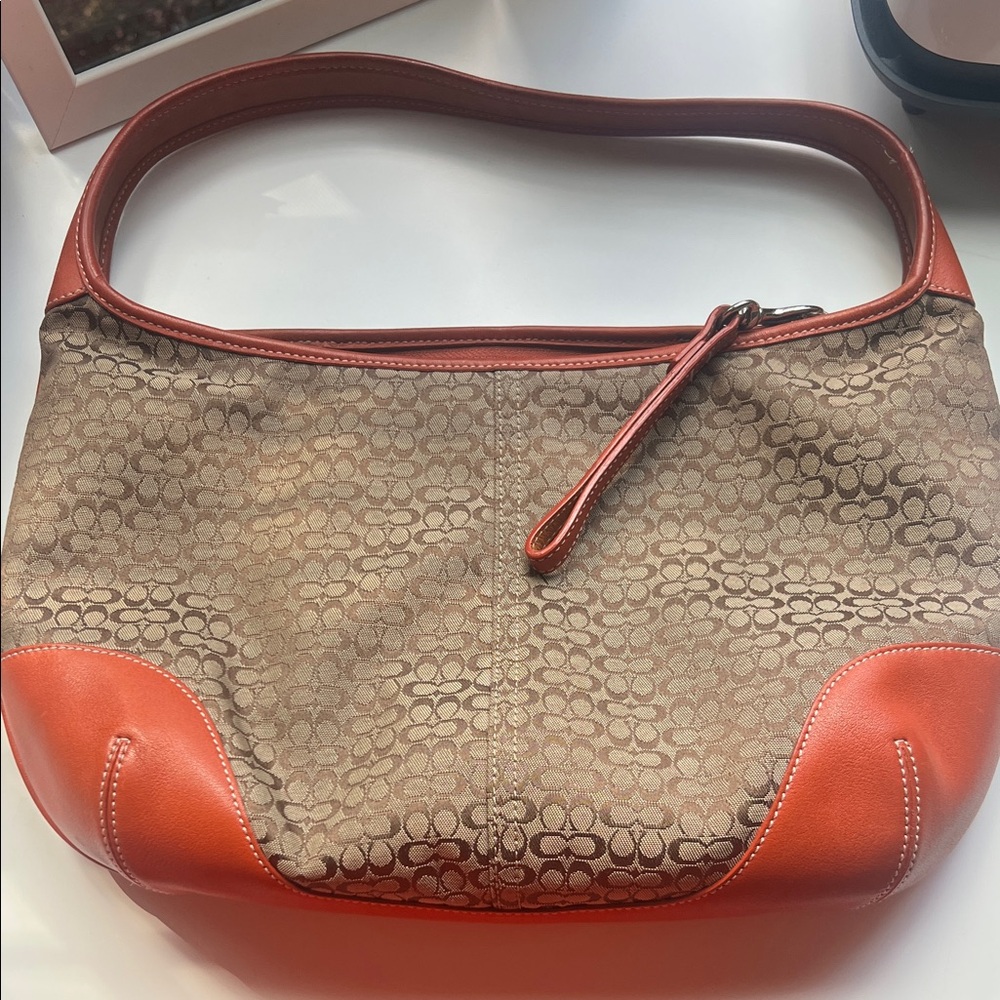 Coach Brown Signature Canvas Shoulder Bag with Orange Leather Trim